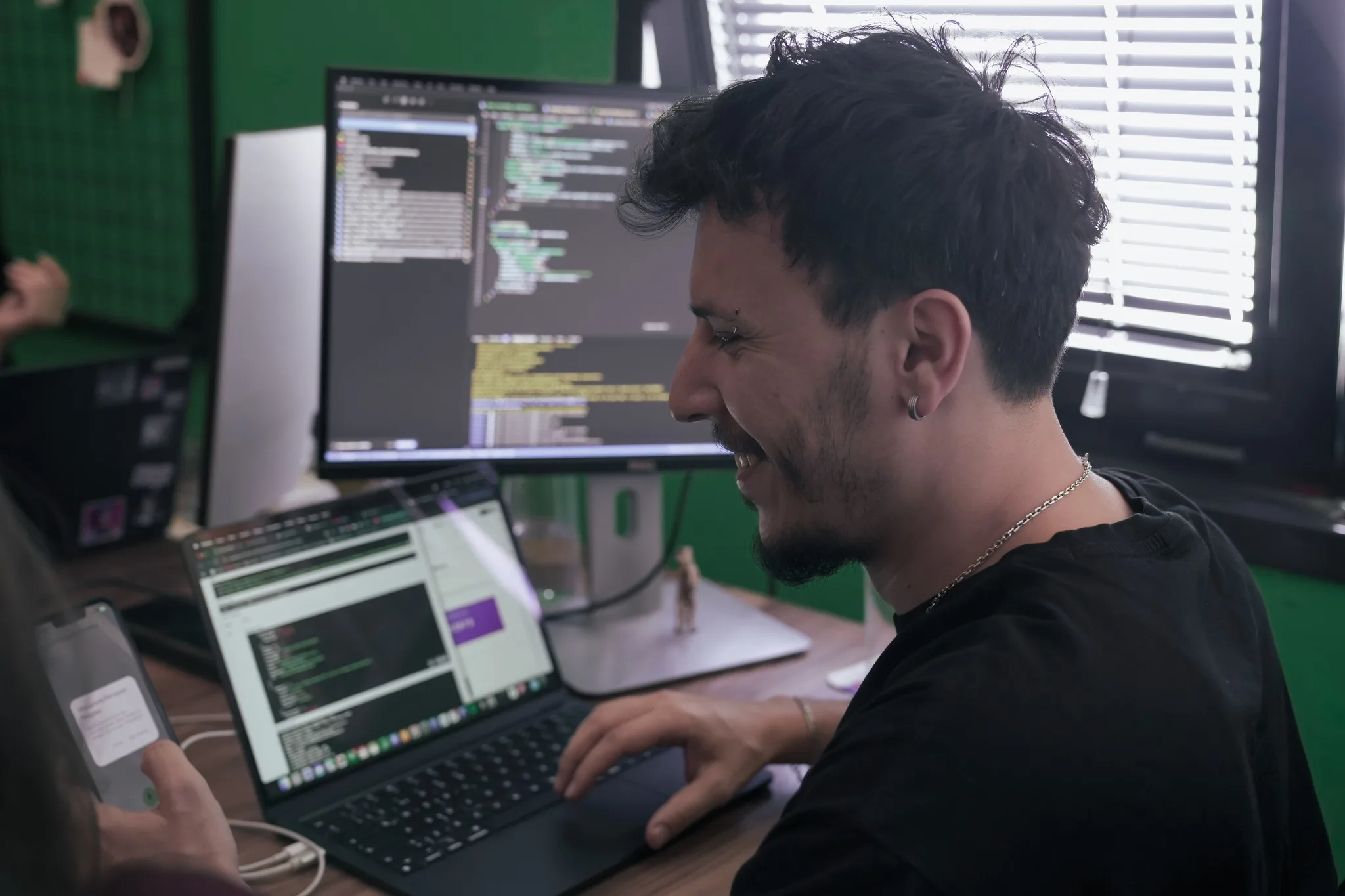 Neon Apps developer coding an AI-based mobile application